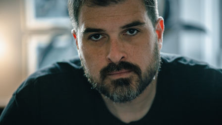 PS260 signs editor Emile Doucette